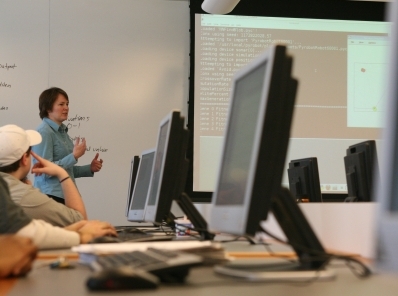 photo: Lisa Meeden teaching in main lab